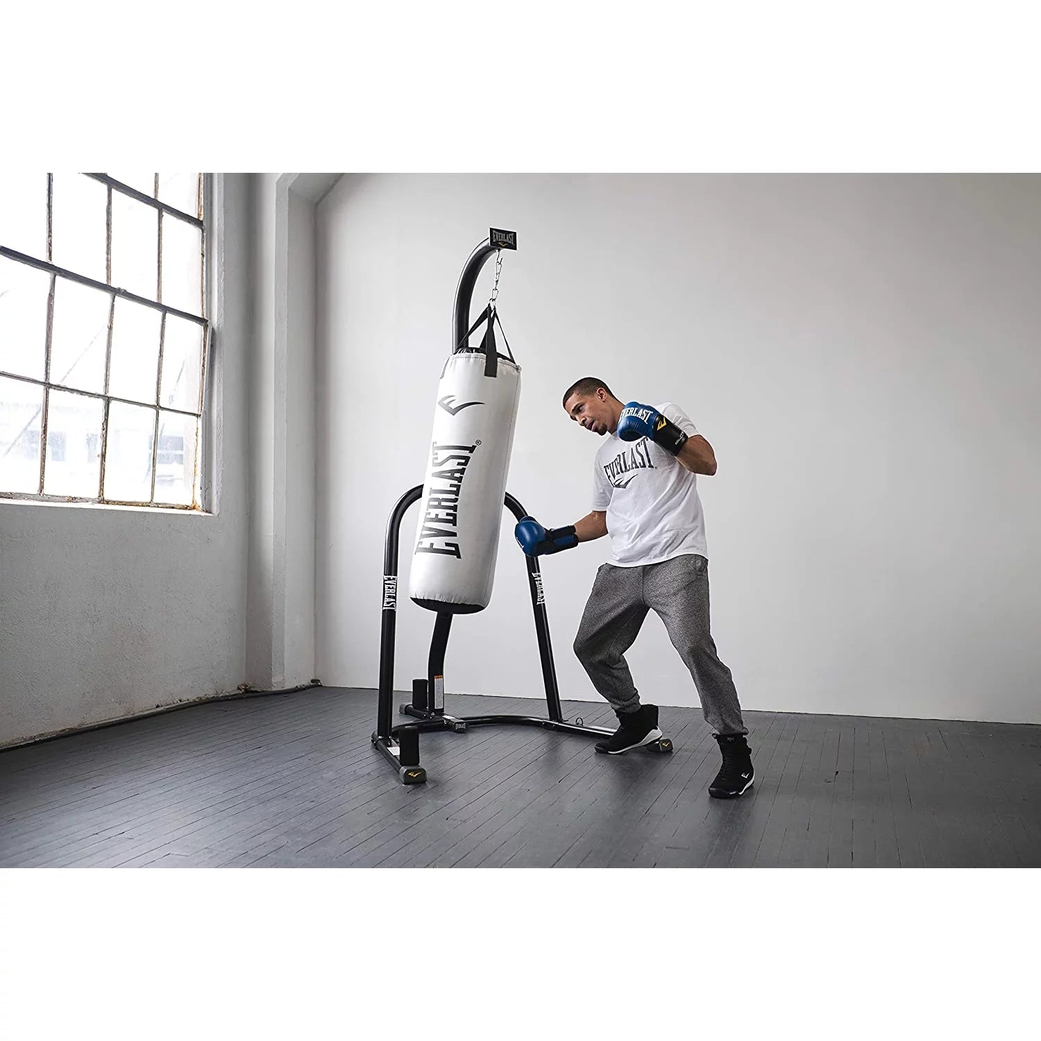 Heavy-Duty Single Station Punching Bag Stand, Powder-Coated Steel Construction, 100 Lb Capacity, Black Finish